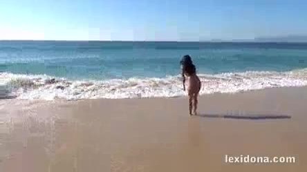 Perfect body girl topless on the beach