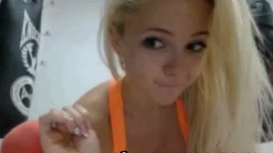 Blonde sexy teen makes hot exercises at gym