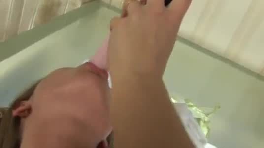 Teen lesbians sharing dildo