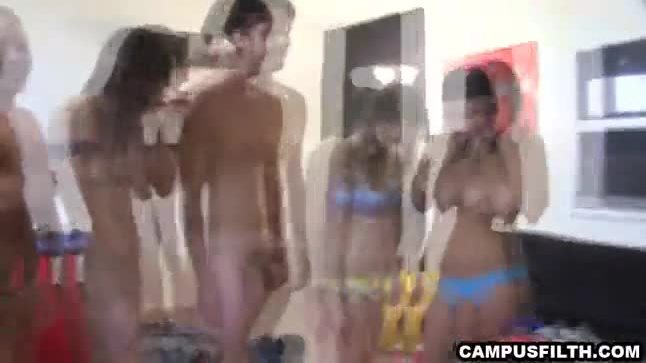 Three naked students have fun in a bedroom